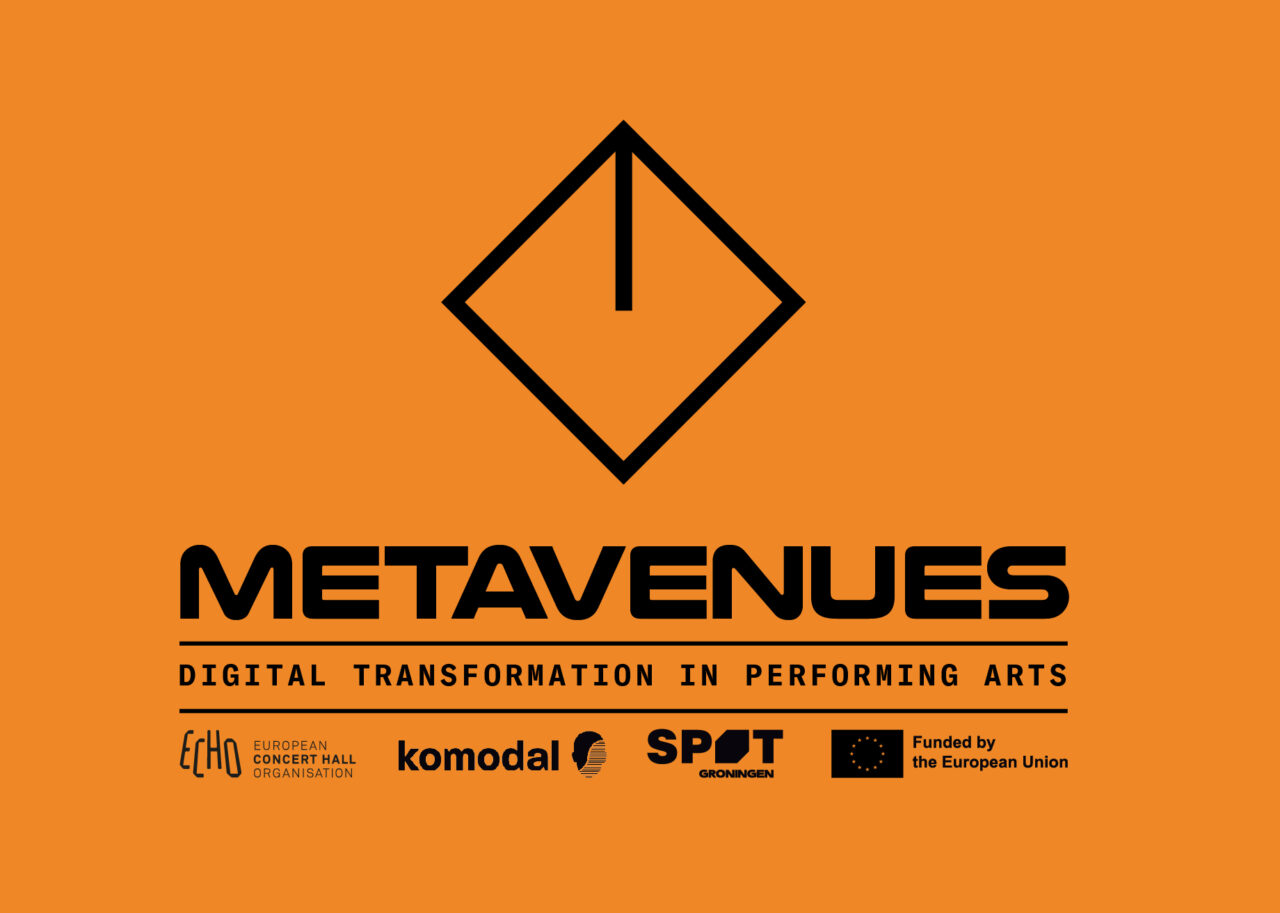 het metavenues logo op een oranje achtergrond